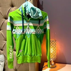 Green and blue hoodie.